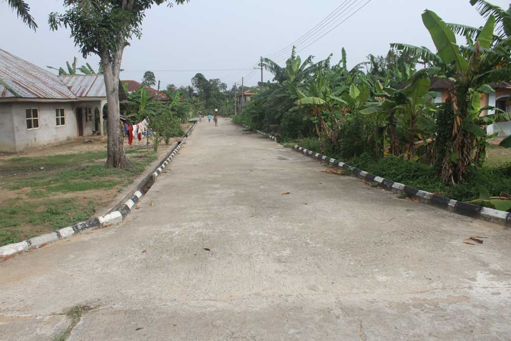 A properly finished concrete walkway in Akumoni community, by Shell